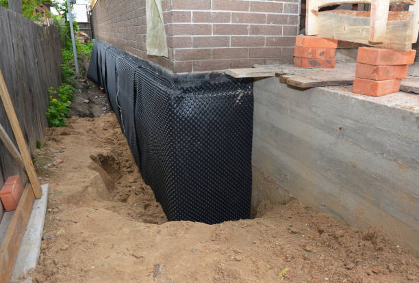 Happy homeowners after waterproofing job in Sylvania